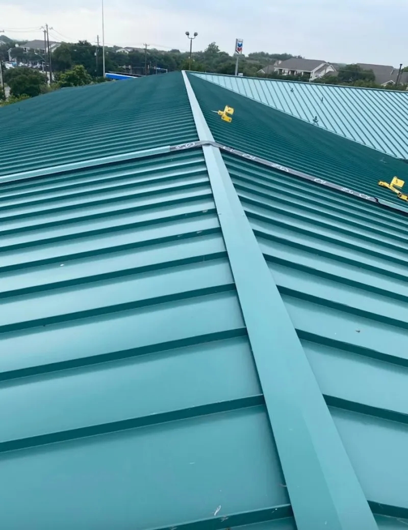 Green commercial metal roof ridge and valley for Metal Roof Repair in Lompoc